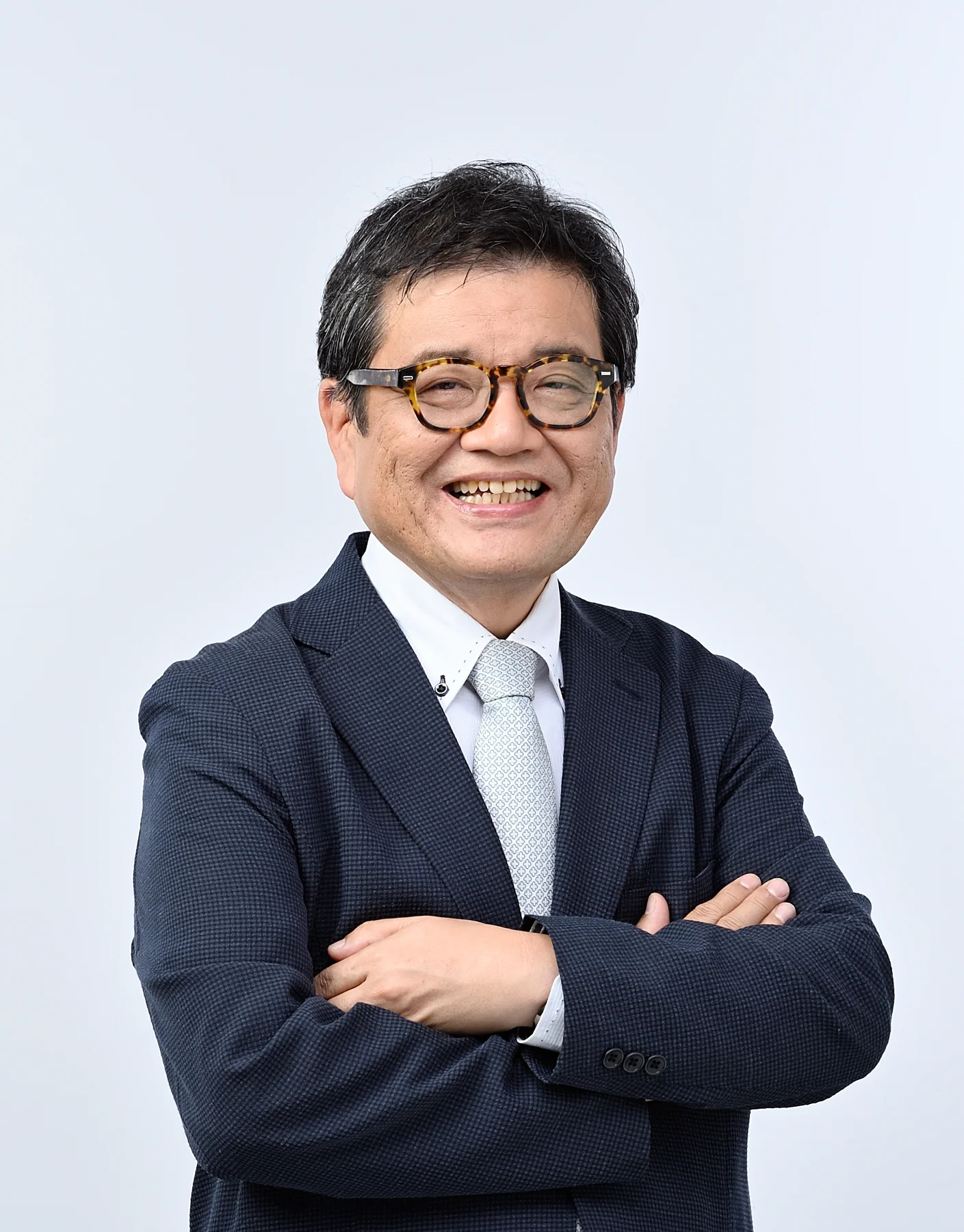 Takuro Morinaga, a professional studio portrait.